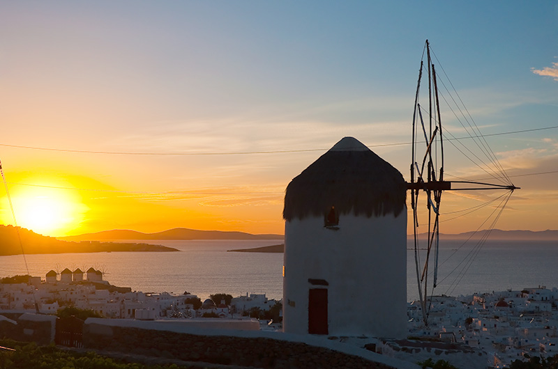 mykonos-windmills-sunset-mykonos-town-chora-view